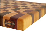 close up of multi colour end grain cutting board with traditional checker pattern