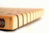 close up of medium maple brick pattern end grain cutting board