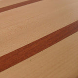 close up of maple fillet board with sapele lines