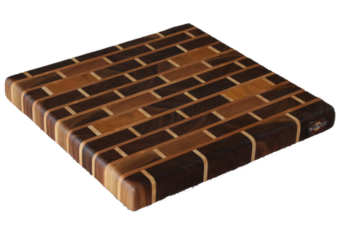 medium walnut brick pattern end grain cutting board with yellowheart and cherry accents on white background