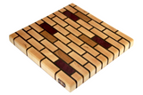 medium maple brick pattern end grain cutting board with cherry and purple heart accents. 